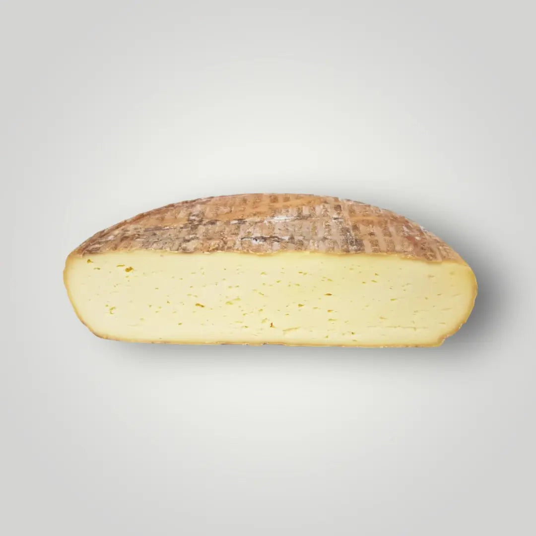 Fromage a raclette paysan de la fromagerie Baechler vendu par JM Monterroir
